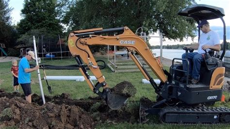 how to operate mini excavator sewer line|Digging Trenches with a Mini.